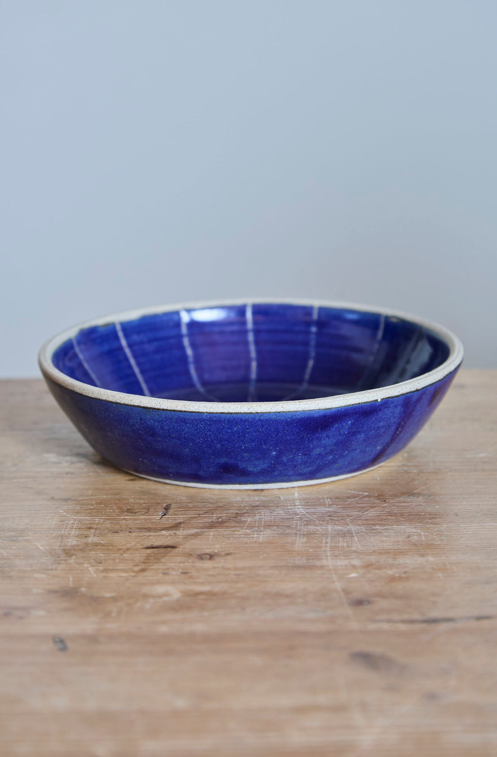 Scored Star Bowl, Indigo on White Clay