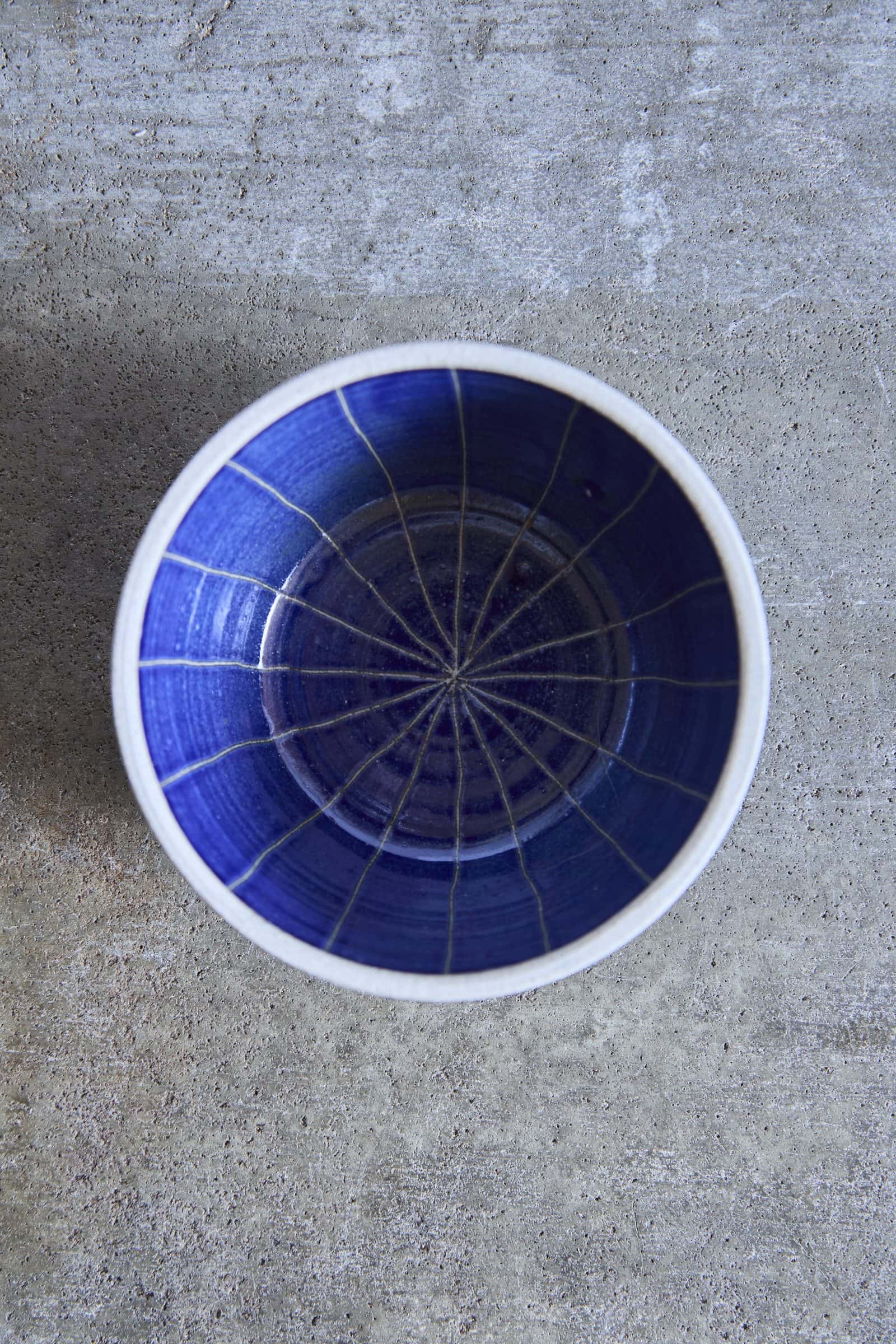 Scored Star Bowl, Indigo on White Clay