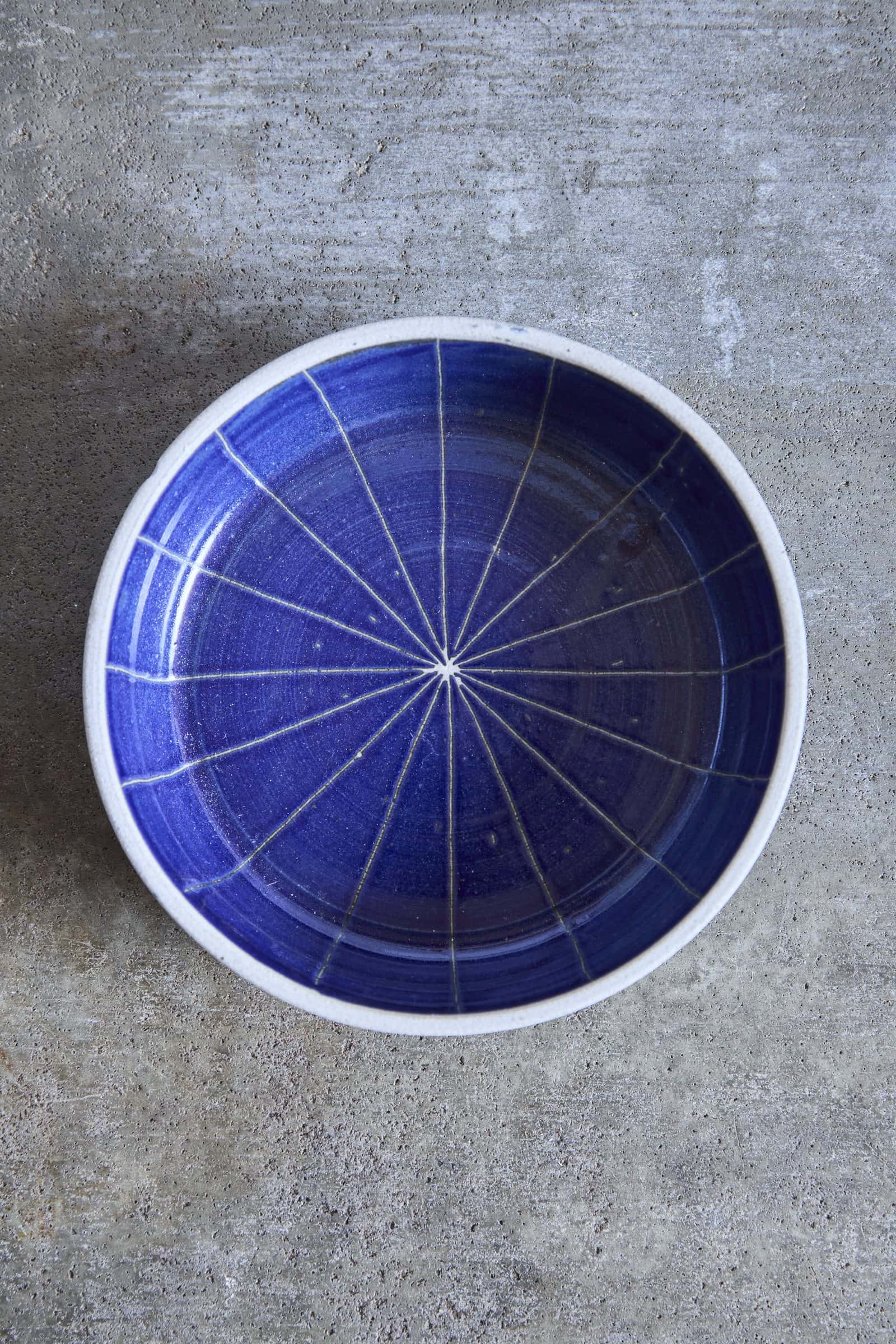 Scored Star Bowl, Indigo on White Clay