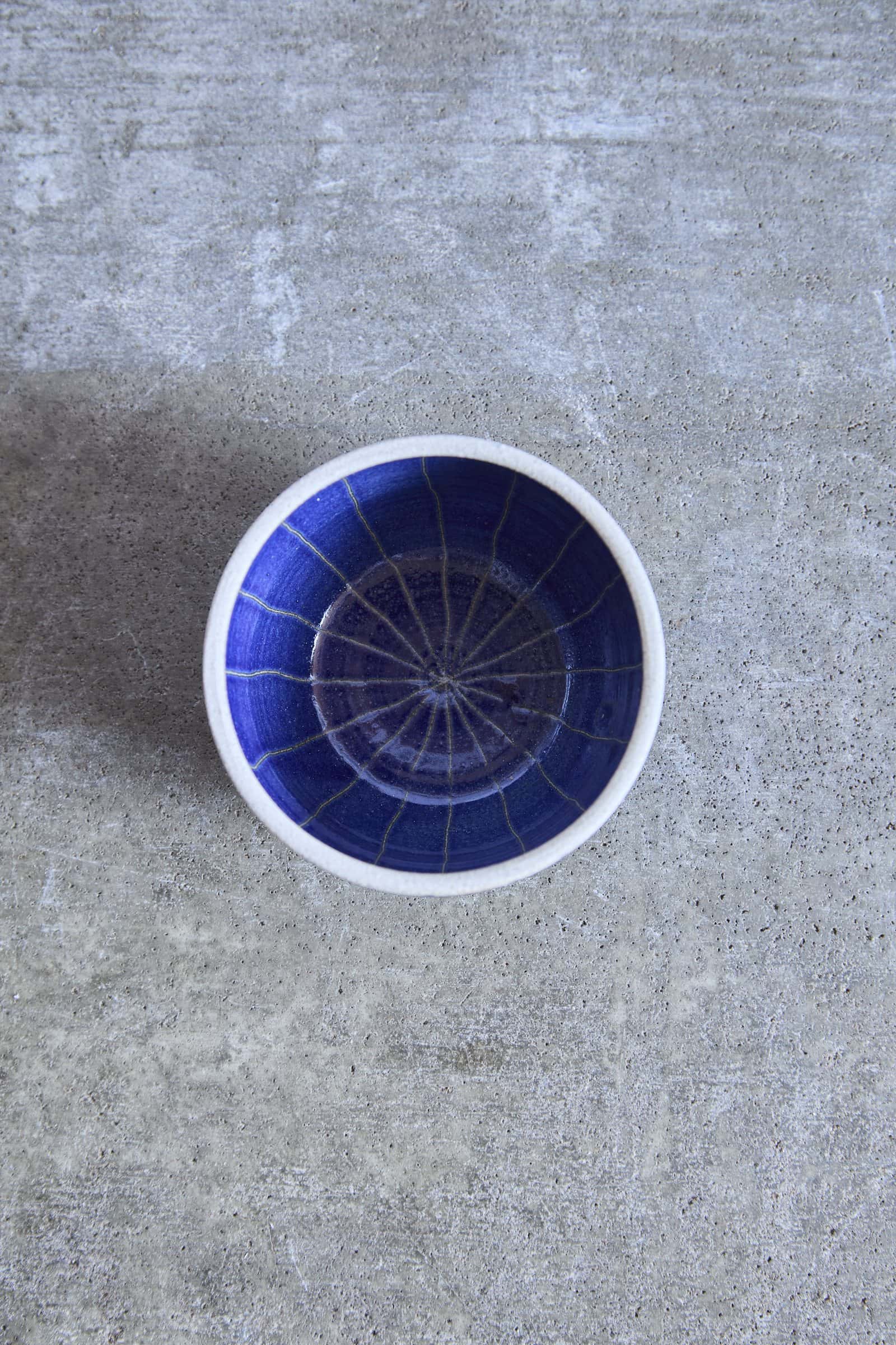 Scored Star Bowl, Indigo on White Clay